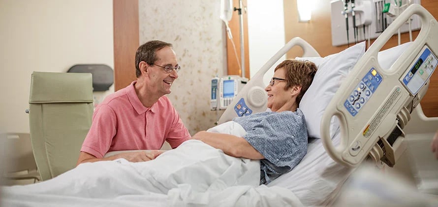 caregiver with patient before surgery
