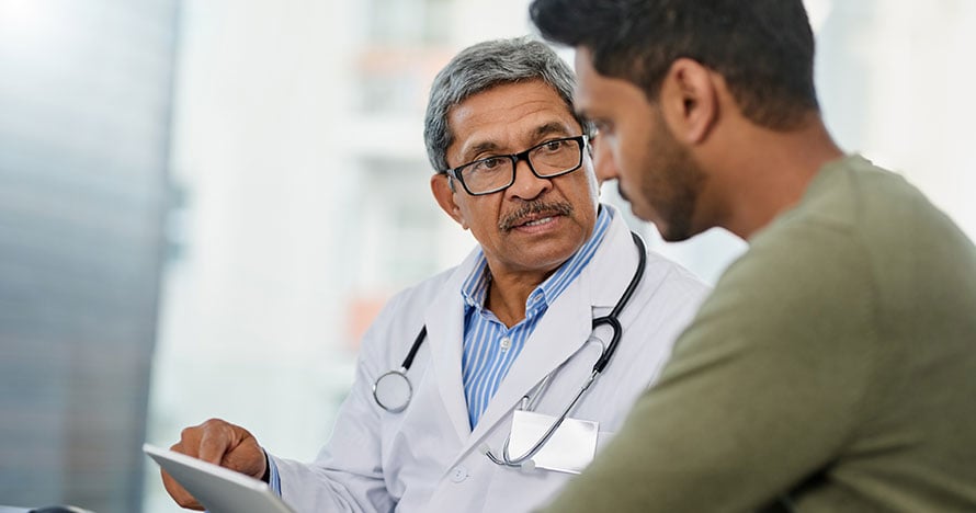 Doctor discussing prostate cancer risk factors