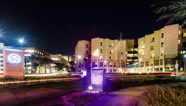 The front of Moffitt's Magnolia campus at night