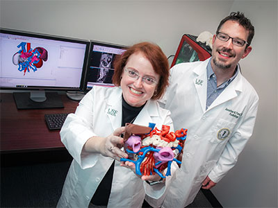Drs. Summer Decker and Jonathan Ford lead USF Health's 3D lab. 