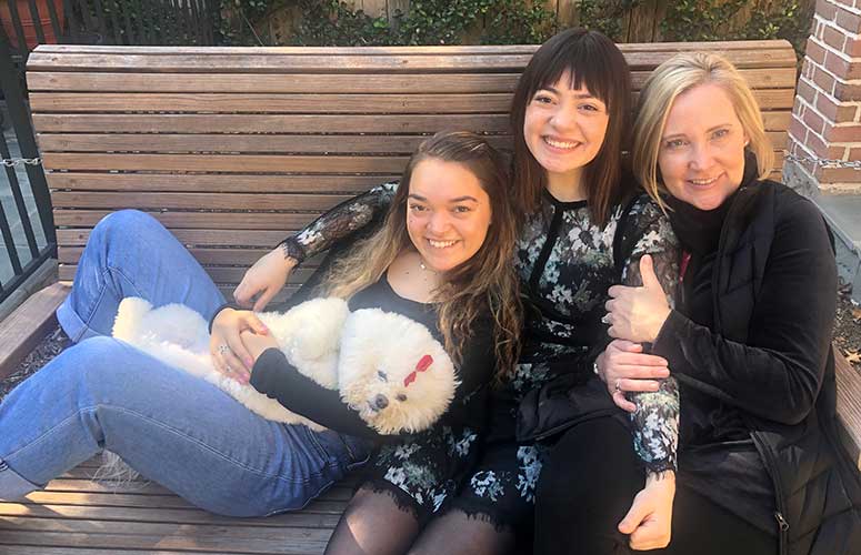 From left: Hwu's daughters, Ally and Emily, wife Katie, and family dog, Maisy.