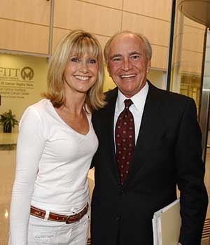 Olivia Newton-John and H. Lee Moffitt met in 2006 when the singer toured the cancer center before performing in a benefit concert.