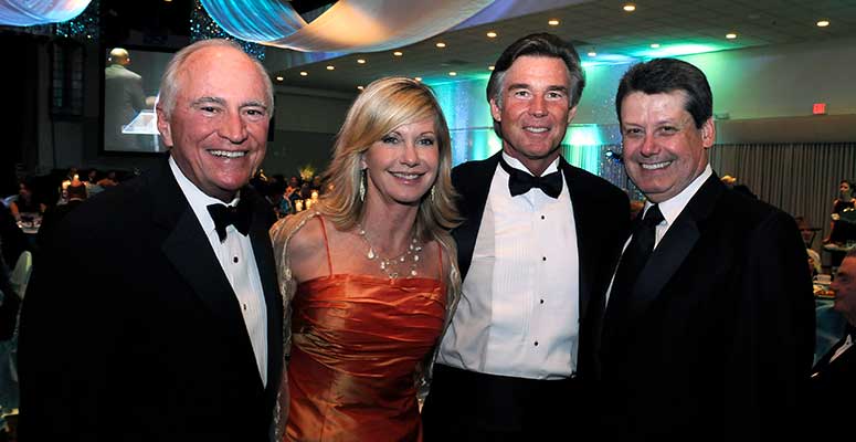 From left, H. Lee Moffitt, Olivia Newton-John and husband John Easterling, and then Moffitt CEO Dr. William Dalton attend the 2009 Magnolia Ball, which raised 