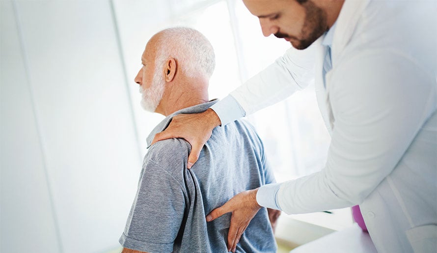 patient experiencing lower back pain