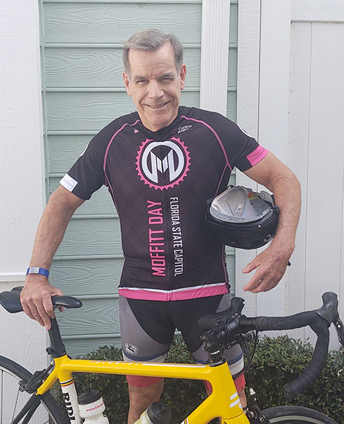 John DesRoches gearing up his bicycle for the annual Cure on Wheels bike ride to Tallahassee.