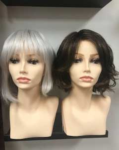 wig examples, one gray and one dark, both chin length