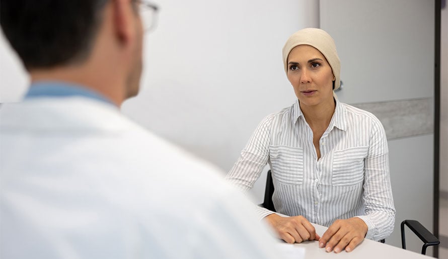 Female patient speaking to doctor about immunotherapy
