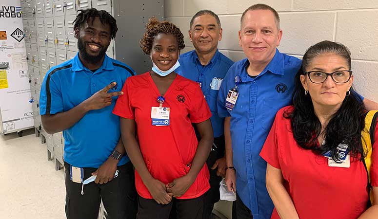 Environmental Services team members include, from left, Steven Jean-Francois, Adjo Viviane Adande, Carlos Vega, Richard Diaz and Diana Pinzon. They must navigate dangerous chemicals to skillfully disinfect the infusion pharmacy.