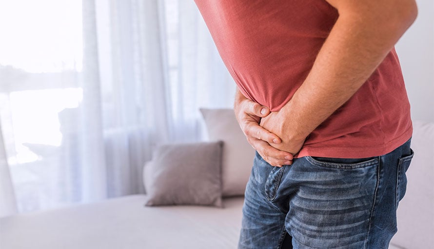 Man with lower bowel pain