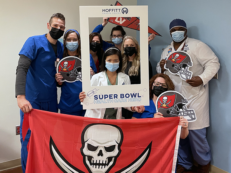 Pam Lowry (bottom right), with members of the Hematology team at Moffitt.