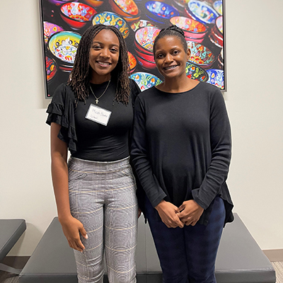 University of Florida freshman Micah Bowen, left, hopes to become a pediatric surgeon through hard work and encouragement from her mentor, Dr. Evita Henderson-Jackson.