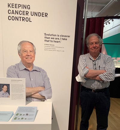 Image of Dr. Robert Gatenby standing in the Moffitt portion of the Cancer Revolution Exhibit
