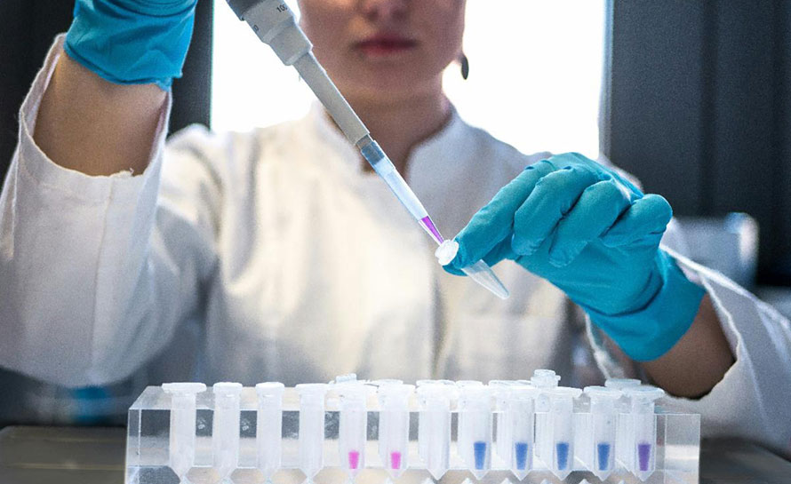researcher with test tube
