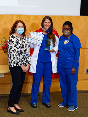 Sarah Hart, RN, 2021 Accredited Preceptor of the Year Award Winner, pictured with Moffitt nurses
