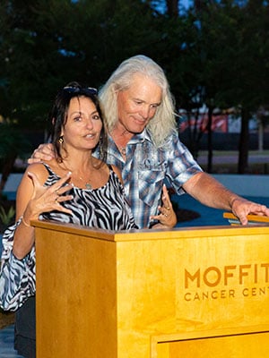 Bruce and Kimmie Hall giving a speech during the REO Speedwagon Fund check presentation