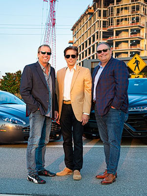 Celebration Exotic Car Festival co-founders Jeff, Jim Ippoliti and board member Bill Johnson C