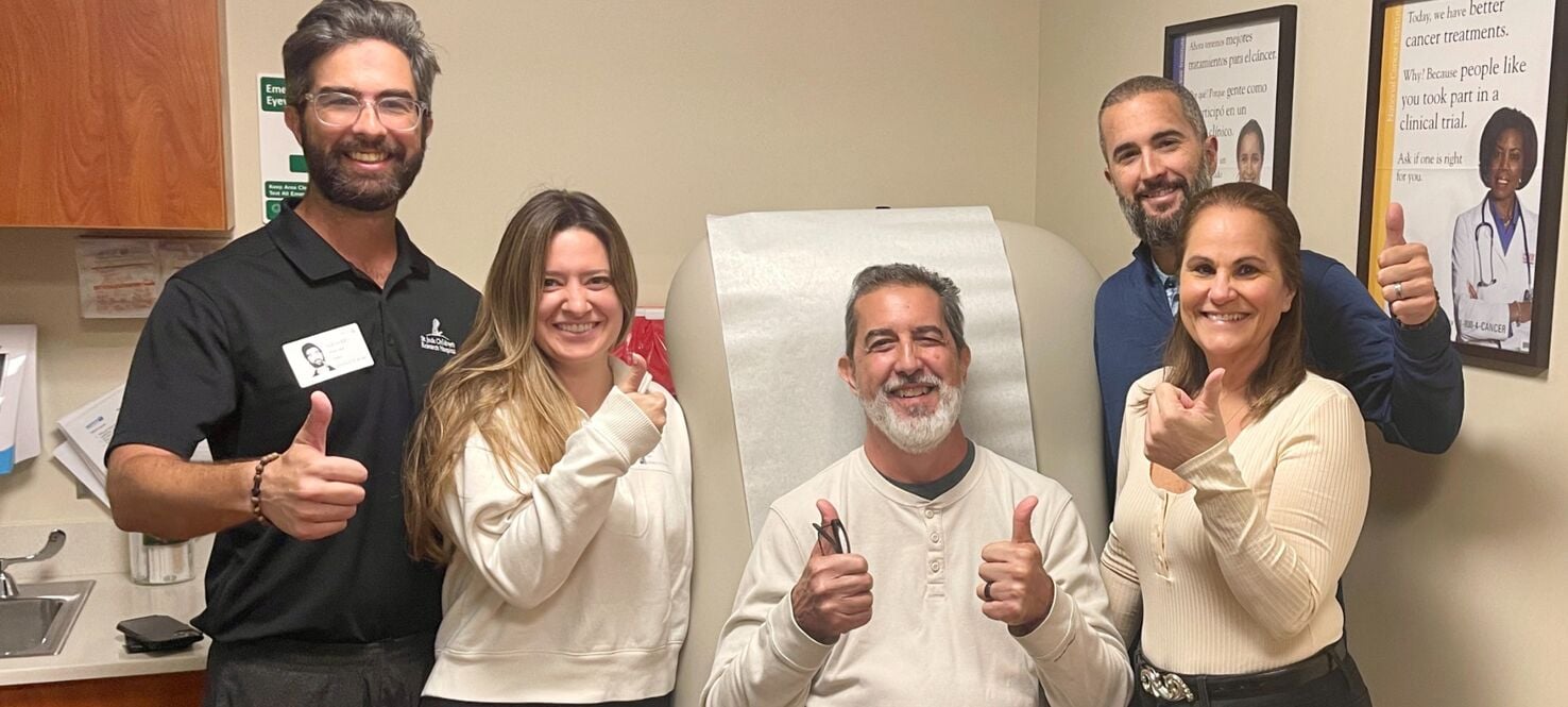 patient giving a thumbs up