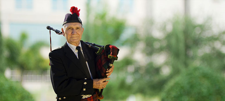 Stanley Carr began playing the bagpipes at age 12