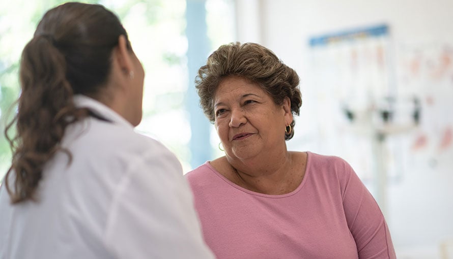 Female patient talking to doctor