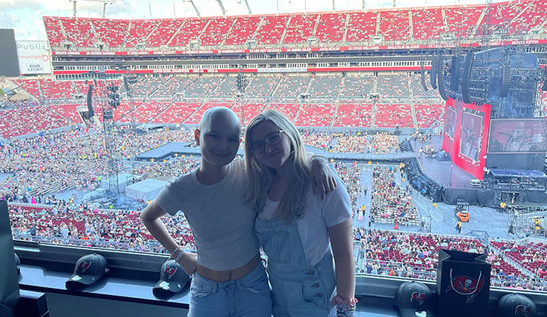 Eldiara Doucette, 21, is in remission from synovial sarcoma for a second time. Being one of the 70,000 concertgoers felt like a miracle. She got to enjoy it with friend Bianca.