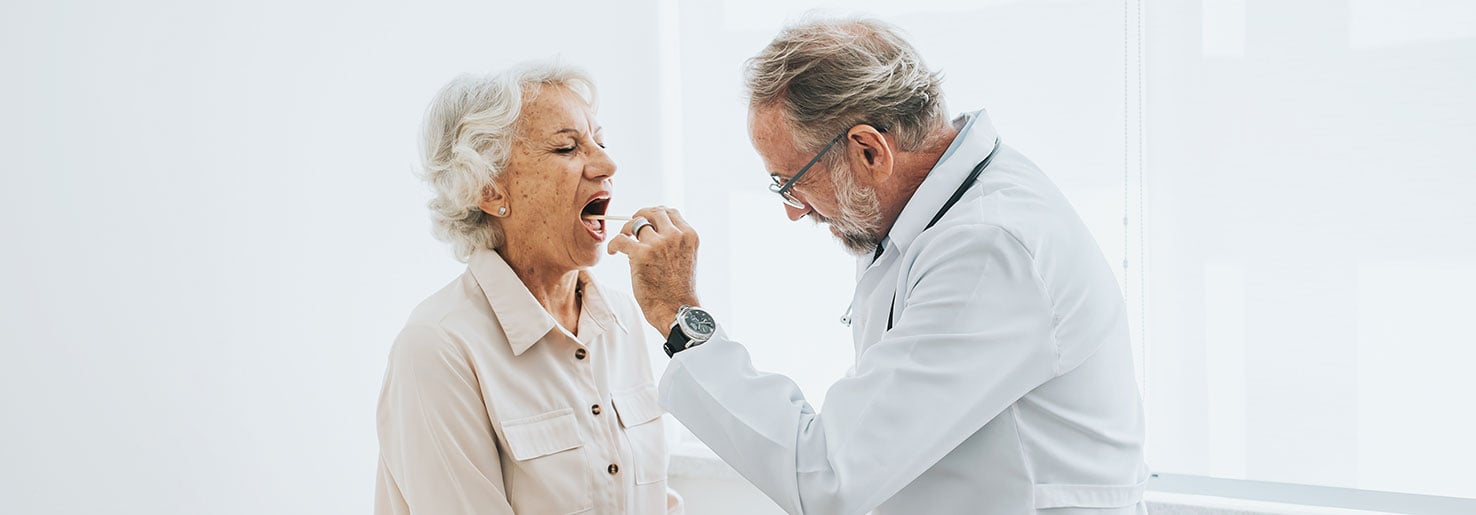 Doctor checking patient for signs of spindle cell carcinoma