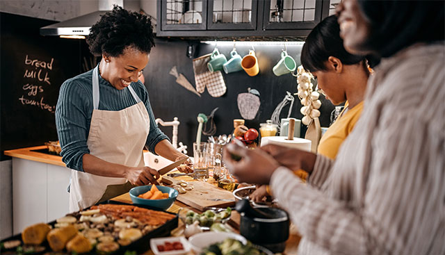Woman preparing a healthy Thanksgiving meal with family