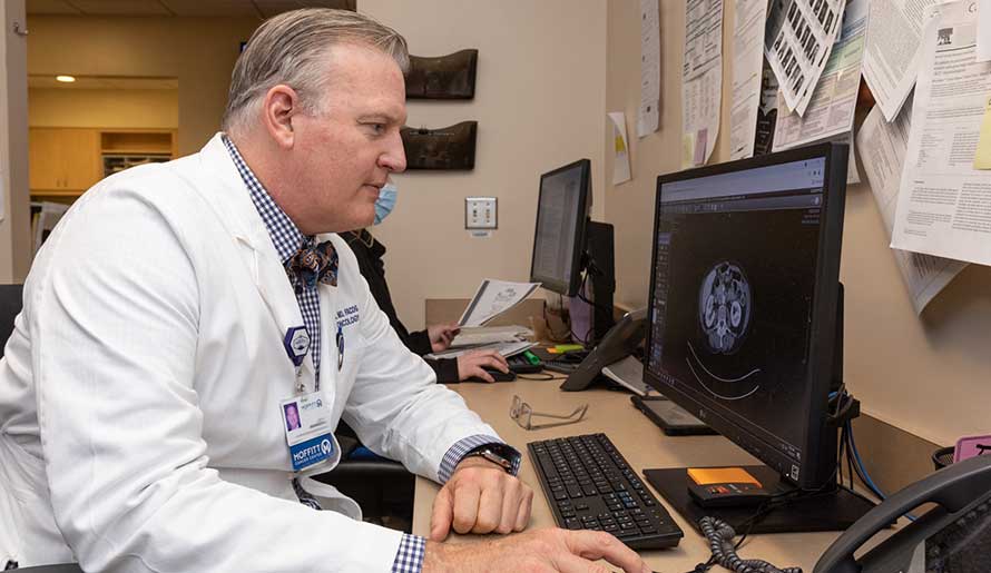 Dr. Robert Wenham studies cancer scans