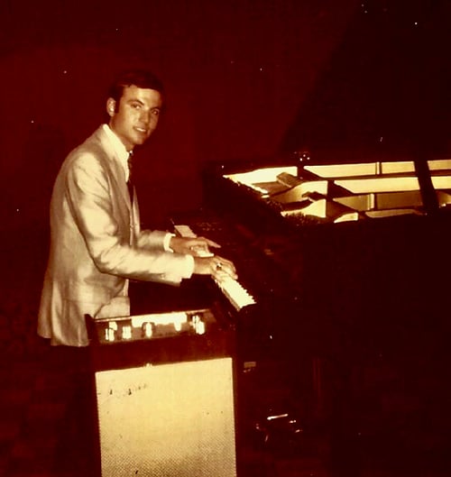 Robinson at the piano bar.