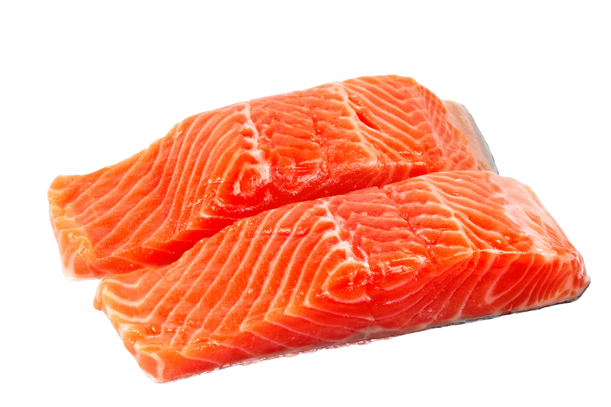 Two pieces of salmon fillet on a white background.