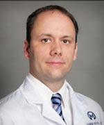 headshot of Dr. Damon Reed