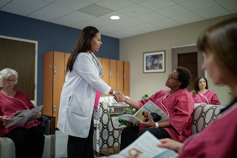 Patient in waiting room before mammogram screening