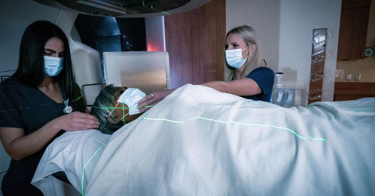 female patient receiving radiation